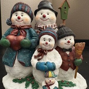 Charming Snowman Family Holiday Decor with Colorful Accents